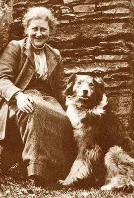 Beatrix Potter outdoors with her collie Kep.